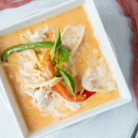 Red Curry · Coconut milk with, bamboo shoots, bell peppers and basil leaves in red curry sauce.

Spicy i...