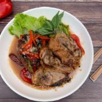 Fiery Crispy Duck · Crispy roasted duck in a sweet and spicy sauce with bell peppers, basil leaves.

Spicy in na...
