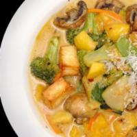 Mango Mazza · Chunks of mango stir-fried with paneer, carrots, broccoli, mushrooms, zucchini, and seasonal...