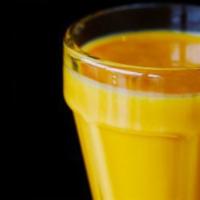 Mango Lassi · Fresh yogurt smoothie with mango