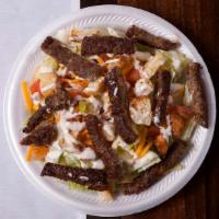 Gyro Salad · Lettuce, tomatoes, feta cheese, and gyro meat.