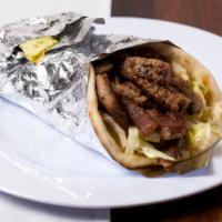 Gyro Sandwich · Lamb meat, tomatoes, onions in a pita bread with tzatziki sauce.