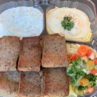 Mediterranean Lamb Plate With Pita Bread صـحن لام  · Lamb, lettuce, pita, tomato, pickles, onion, tzatziki, and choice of sauce. Hot sauce, garli...