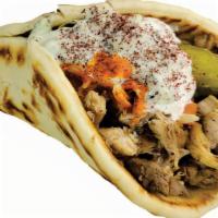 Large Chicken Gyro دجـاج جـايـرو  · Chicken, lettuce, tomato, pickles, onions, tzatziki, and choice of sauce. Hot sauce, garlic ...