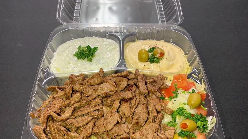 Beef Plate With Pita Bread صـحن بيـف  · Beef, rice, pita, onion, tomato, tzatziki, lettuce, and choice of sauce. Hot sauce, garlic sauce.