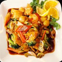 Happy Family · Fresh shrimp beef chicken scallop and crab meat sauteed with mixed vegetables in brown sauce.