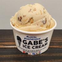 Peanut Butter Cup Ice Cream · Creamy caramel base with chunks of chopped Reese's peanut butter cups.
