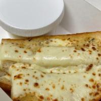 Garlic Bread (T) · Favorite. Toasted organic French bread seasoned with garlic, butter and spices. (Side of mar...