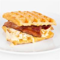 Breakfast Sammy · Sandwich with thick applewood bacon, over medium eggs, cheese, and special sauce.