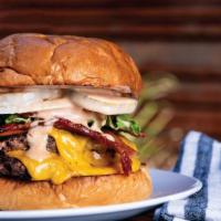 The Classic Double · Two 1/4 lb.  beef patties, with american cheese and hickory smoked bacon. Topped with lettuc...