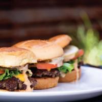 The Park Burger Sliders · 3 beef sliders topped with american cheese, lettuce, tomato, pickle, and our house made burg...