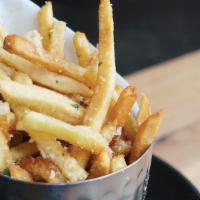 Small Parmesan Truffle Fries · Golden brown french fries tossed in a blend of parmesan cheese, truffle oil, and parsley.