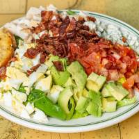 Cobb Salad · romaine lettuce, hard-boiled egg, tomatoes, bacon, chicken, blue cheese crumbles, with choic...