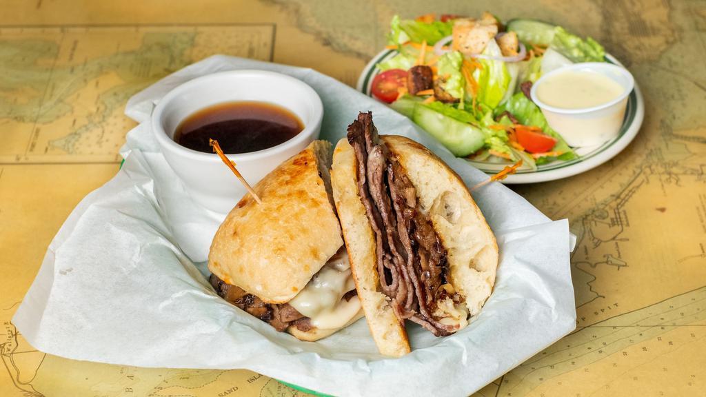 French Dip · Top round roast beef on toasted French roll served with au jus.