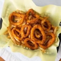 Calamari 'N Chips · Hand breaded calamari with seasoning and deep-fried.