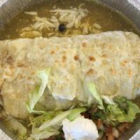 Burrito · Choice of meat,flour tortilla,rice,black  beans,cilantro,onios,ranch. On the side:lett,pico,...