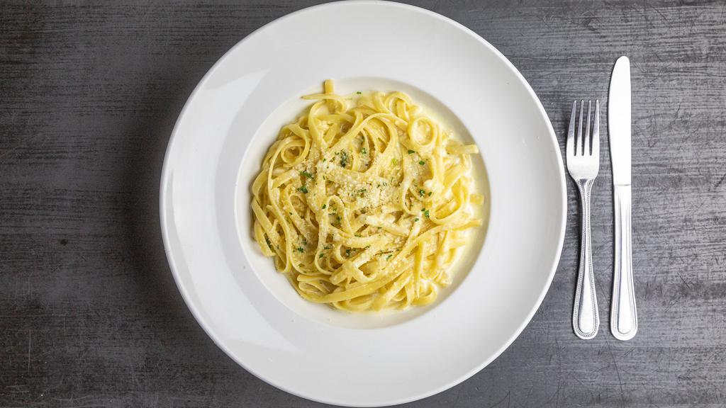 Fettuccine Alfredo · Egg noodles tossed with a perfect blend of cream, cheese and butter.