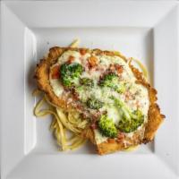 Chicken Marco · Breaded chicken cutlet topped with four cheeses, red onion, tomatoes, garlic, basil, and bro...