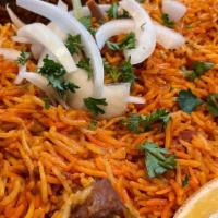 Kabsa Meat · Blend lamb meat with tomato sauce and seasoned rice.