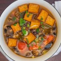 Tom Yum Soup · Mushroom, tomato, tofu, cilantro, and lemongrass in vegetables broth.