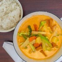 Pineapple Curry · Coconut cream, pineapple, onions, carrots, bell peppers, tofu, sweet basil, and bamboo shoots.