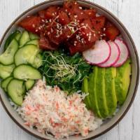 Spicy Tuna · Spicy tuna, cucumber salad, seaweed salad, avocado, crab mix, radish, organic sprouts.