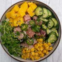 New Style Hamachi · Yellowtail, mango, cucumber salad, sweet corn, organic sprouts, cilantro, jalapeno.