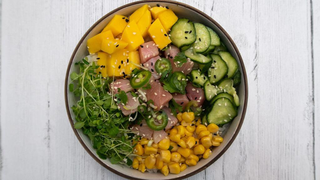 New Style Hamachi · Yellowtail, mango, cucumber salad, sweet corn, organic sprouts, cilantro, jalapeno.