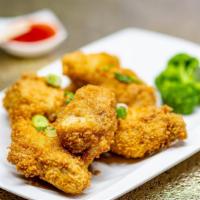 Chicken Wings (6Pc) · Topped with green onions and garlic. Served with sweet chili sauce.