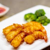Fried Prawns (6Pc) · Seasoned with garlic, salt, pepper. Served with sweet chili sauce.