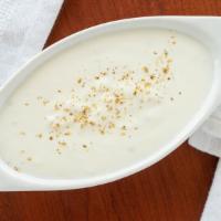 Raita · Yogurt made in-house mixed with roasted cumin and shredded cucumber. (Vegetarian/gluten free)