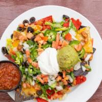 Half House Nachos · Fresh house made chips with everything you expect from nachos. Melted cheddar or jack cheese...