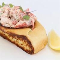 Maine Lobster Roll · Chilled Maine lobster salad in a buttery toasted bun, topped with microgreens.
