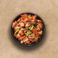 Classic Chili Chicken · Perfectly fried chicken morsels tossed and stir-fried with hot chilli sauce, onions, bell pe...