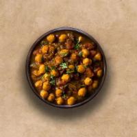 Garbanzo Masala · Chickpeas cooked with farm-fresh vegetables and special herbs.