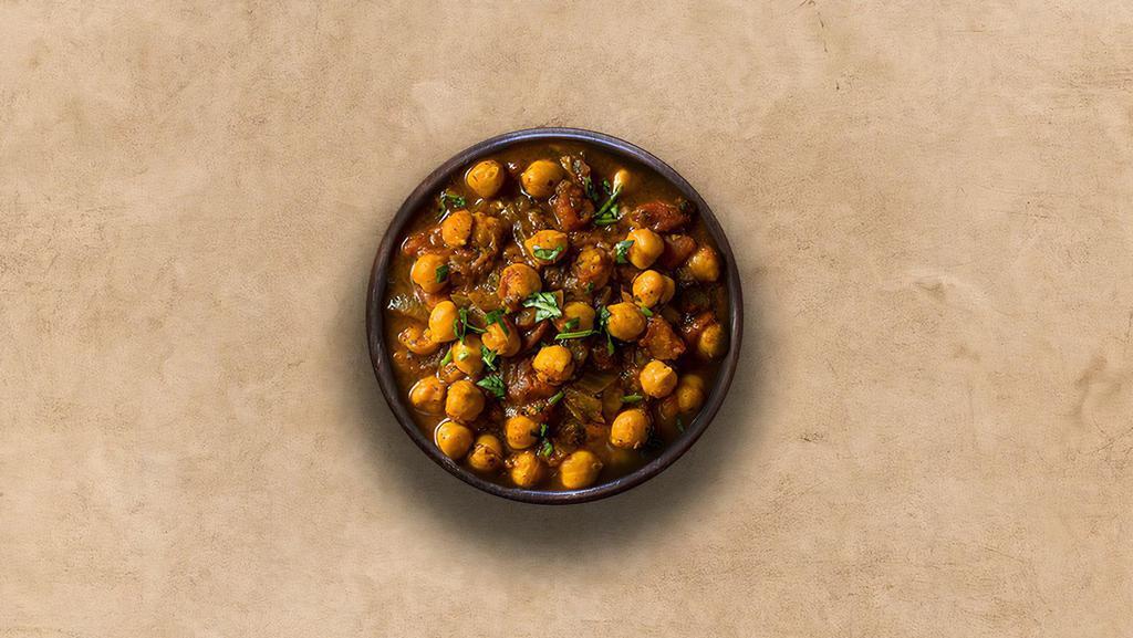 Garbanzo Masala · Chickpeas cooked with farm-fresh vegetables and special herbs.