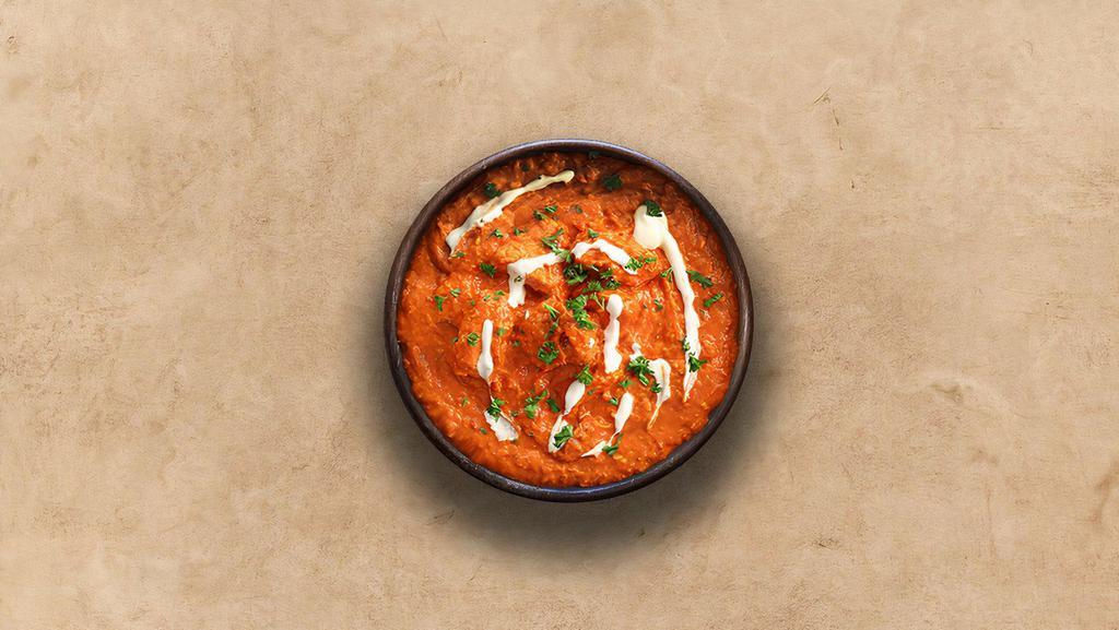 Butter Chicken Fantasy · Grilled chicken morsels braised in a tomato and butter gravy, seasoned with aromatic herbs.
