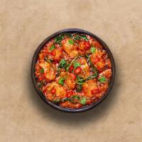 Spice Lane Chicken Curry  · Tender chicken cooked in Indian style with ginger, garlic, onion, and tomato masala.