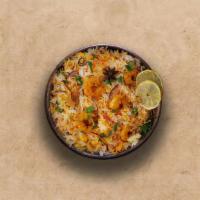 Spice Lane Shrimp Biryani · Long grain basmati rice cooked with fresh shrimps and aromatic Indian herbs.