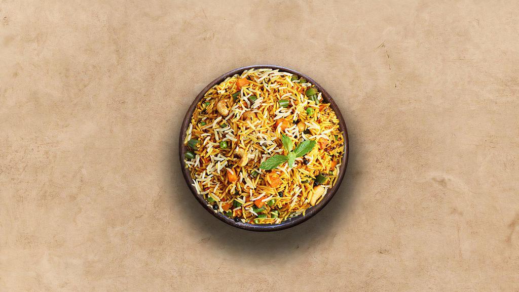 Spice Lane Veggie Biryani · Long grain basmati rice cooked with farm-fresh vegetables and aromatic Indian herbs.