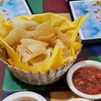 Chips And Salsa · Bag of chips with (32 oz). salsa fresca.