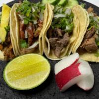 #2 Taco Special $10.50 W/ Rice, Beans, & A Side Salad · 3 tacos served with your choice of meat, with cilantro, onion, lime, radish, and cucumber, a...