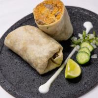 Burrito · Large flour tortilla filled with beans, mozzarella cheese, cilantro, and your choice of meat