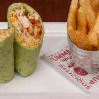Whiskey River Bbq Chicken Wrap · We corralled the renegade flavors of the Southwest into a tasty spinach tortilla: grilled ch...