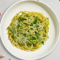 Pesto Spaghetti · Fresh basil leaves, garlic, grated parmesan cooked with Spaghetti.