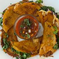 (3) Quesatacos · Pan fried tacos made with beef birria (juicy shredded beef) comes with melted cheese, cilant...