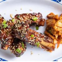 Wok Bbq Pork Ribs - Lunch · Sticky sauce, herbs, crunchy garlic, kimchi (3).