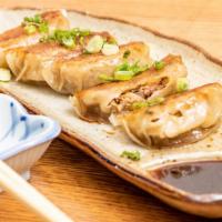 Gyoza · Seasoned beef and vegetable potstickers, kimie's family recipe.