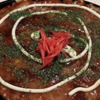 Okonomiyaki - Vegetable Pancake, Japanese Favorite · A choice of beef, pork belly, shrimp, or yariika (squid).