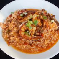 Jambalaya · A creole style blend of tomato, andouille sausage, chicken, and shrimp tossed with white rice.